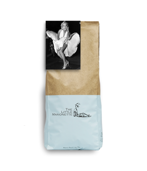 Bag of The Little Marionette Signature Legs 11 Blend specialty coffee beans in branded packaging, hand-roasted in Sydney and made from ethically sourced beans with balanced profile.