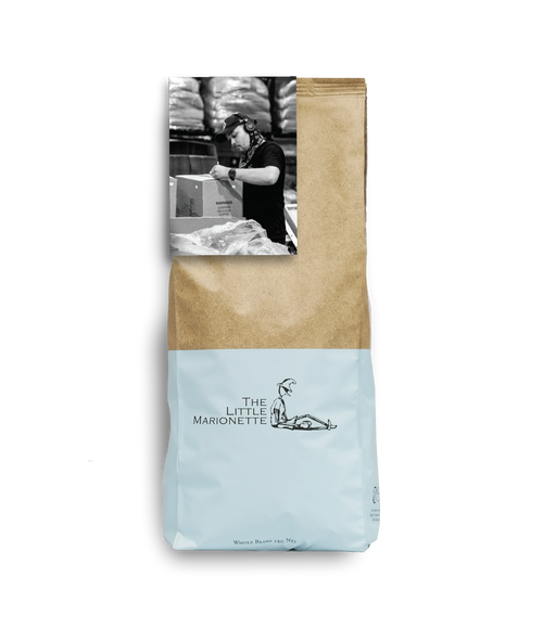 Bag of The Little Marionette Signature Sanchez Blend specialty coffee beans in branded packaging, hand-roasted in Sydney and made from ethically sourced beans with dark chocolate, cherry and spice notes. 